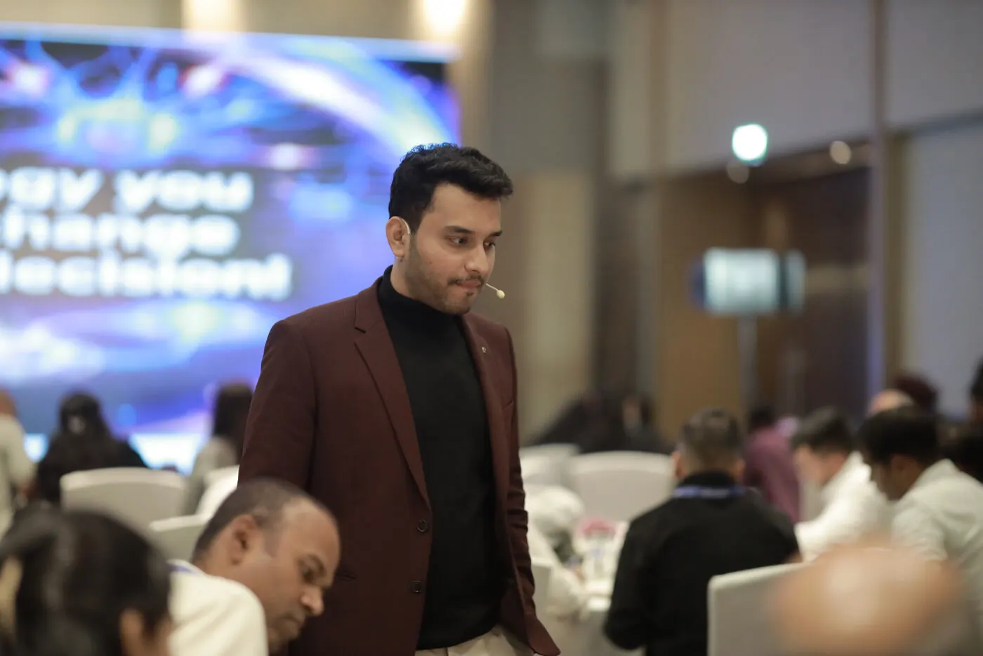Deven U Pandey speaking at a live AI workshop